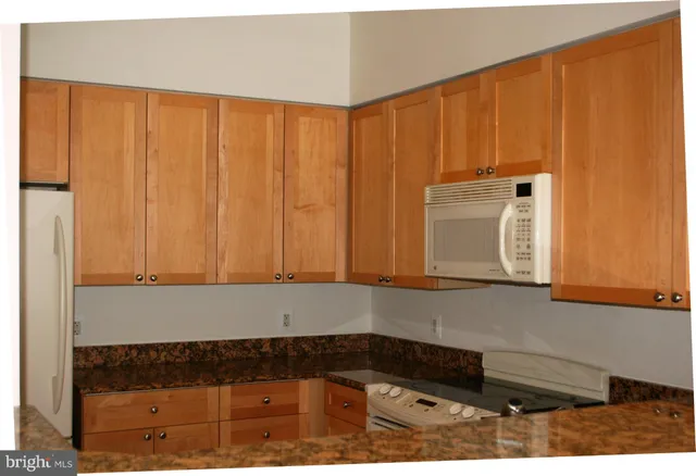 a bathroom with a sink and a window