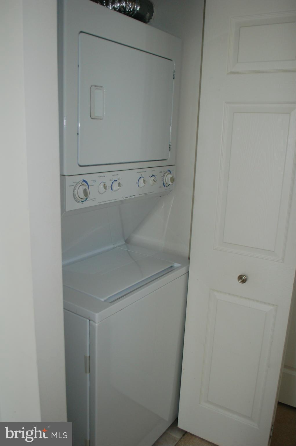 3101 North Hampton Drive, Unit 109 Alexandria, VA 22302 - Photo 8 of 10 a close view of washer and dryer