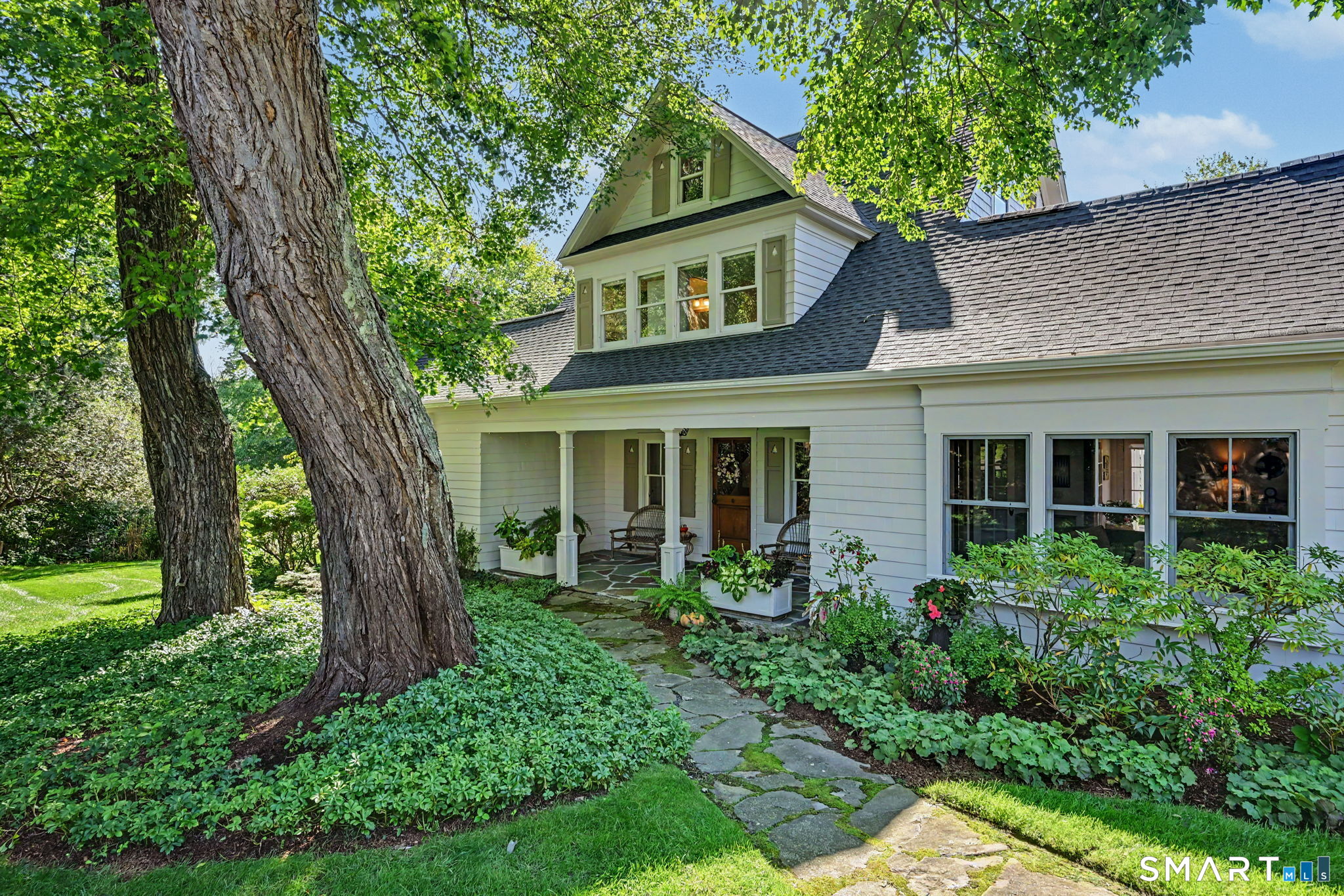 Front entrance of home with original 1900's front door.