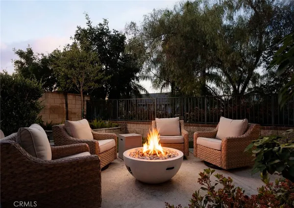 a outdoor living space with patio furniture and a potted plant