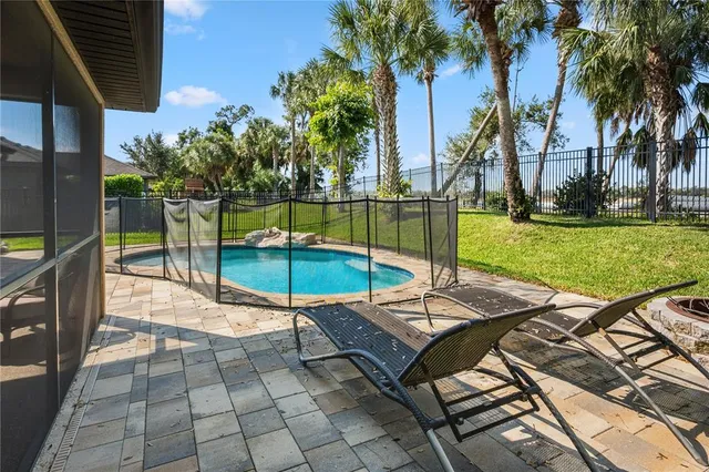 an aerial view of multiple houses with yard