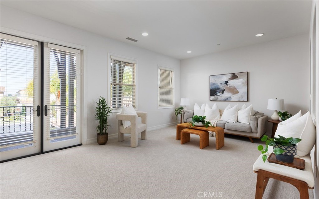 26 Via Fontibre San Clemente, CA 92673 - Photo 23 of 52 a living room with furniture and large windows