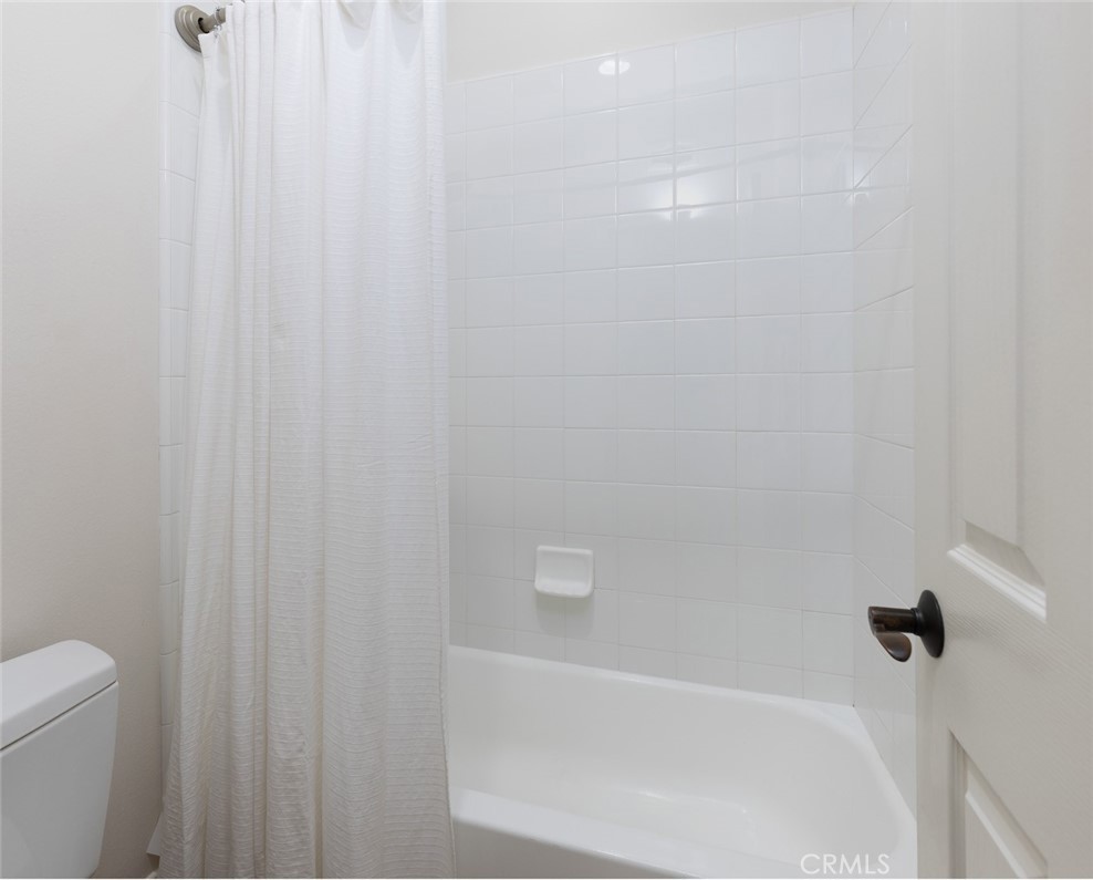 26 Via Fontibre San Clemente, CA 92673 - Photo 29 of 52 a close up of a bathtub curtain