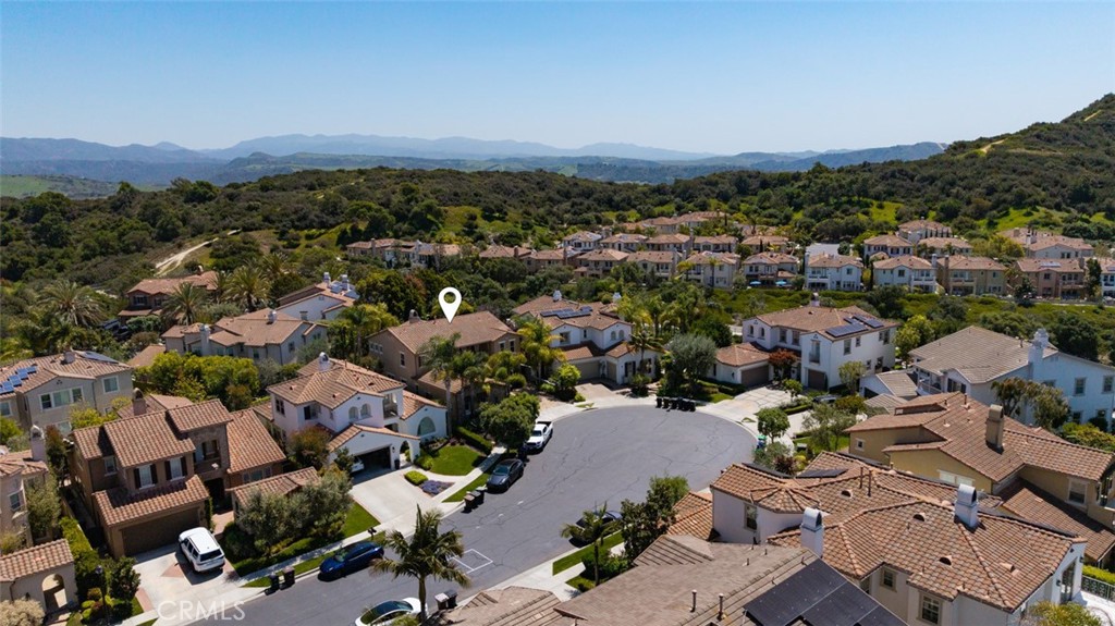 26 Via Fontibre San Clemente, CA 92673 - Photo 49 of 52 an aerial view of a city with lots of residential buildings and mountain view in back