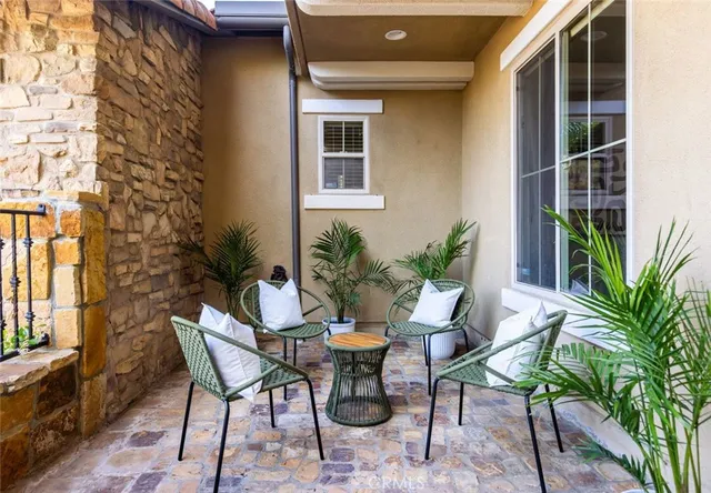 a table and chairs in front of a door