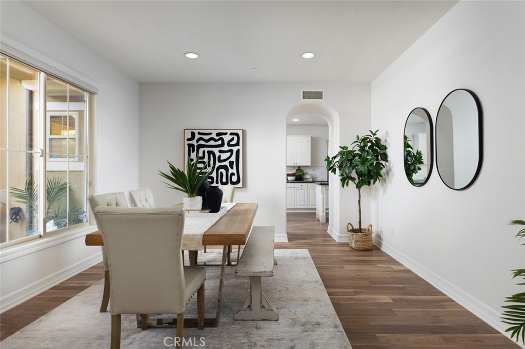 26 Via Fontibre San Clemente, CA 92673 - Photo 9 of 52 a view of a dining room with furniture a chandelier and wooden floor