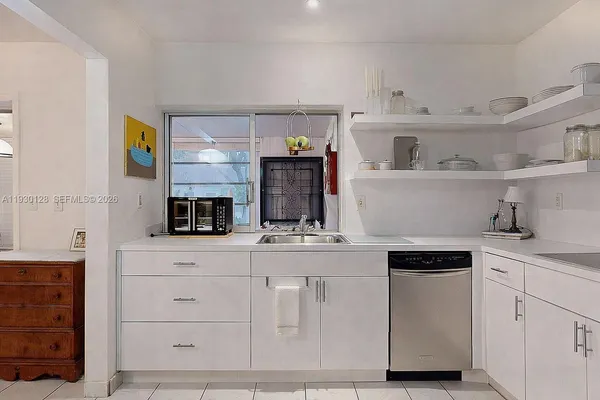 a view of a workspace with furniture