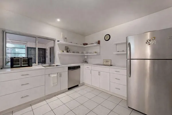 a bed room with a bed and a couch