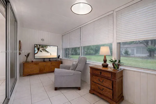 a bathroom with a sink toilet and mirror