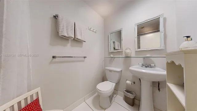 a view of a a dining room with furniture window and wooden floor