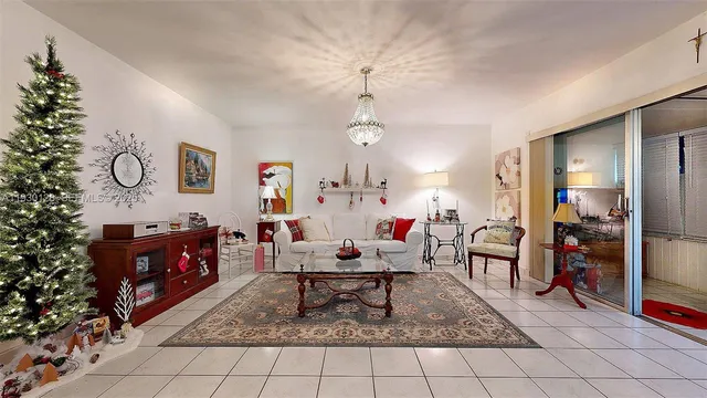 a kitchen with a sink appliances and cabinets
