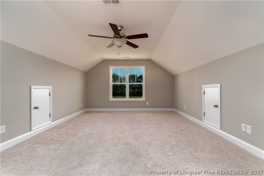 5229 Bree Bridge Road Hope Mills, NC 28348 - Photo 17 of 18 a view of an empty room with a window