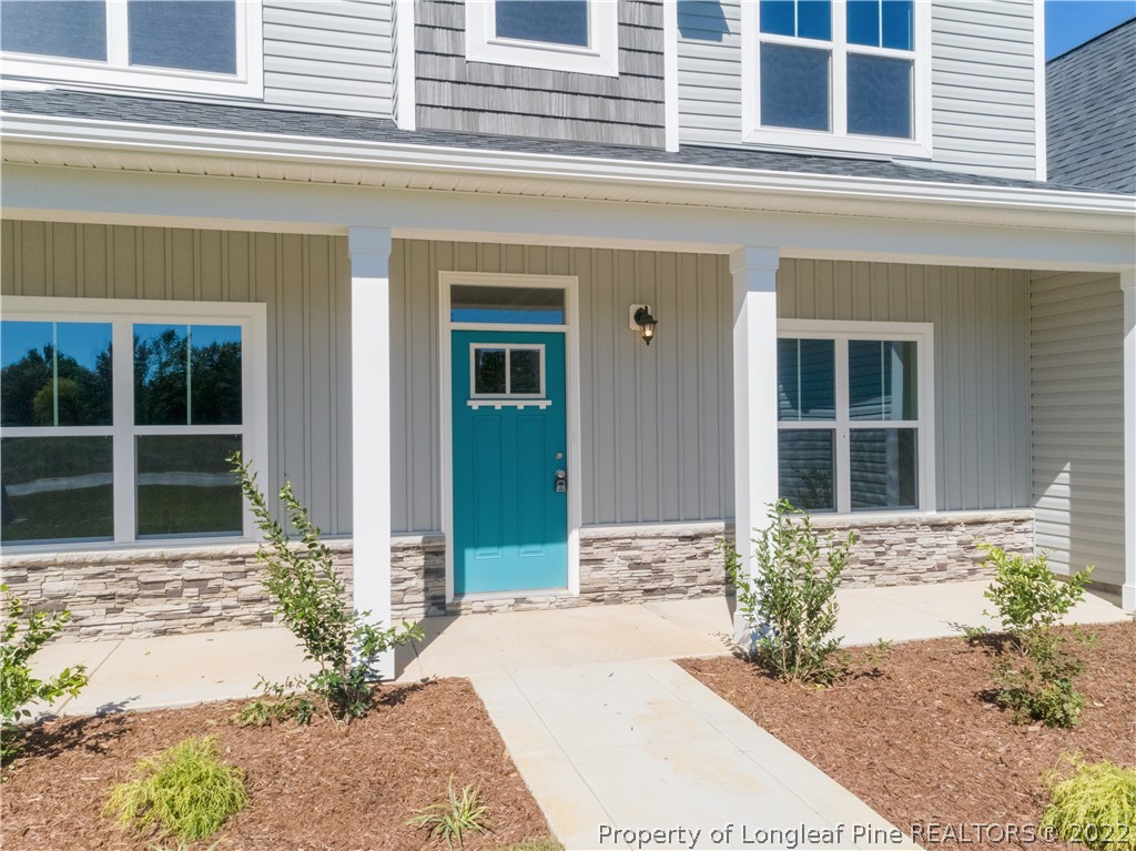 5229 Bree Bridge Road Hope Mills, NC 28348 - Photo 2 of 18 a front view of a house
