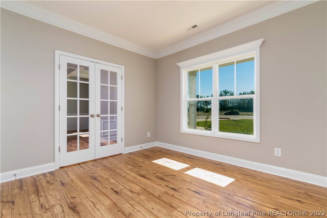 5229 Bree Bridge Road Hope Mills, NC 28348 - Photo 5 of 18 a view of an empty room with a window