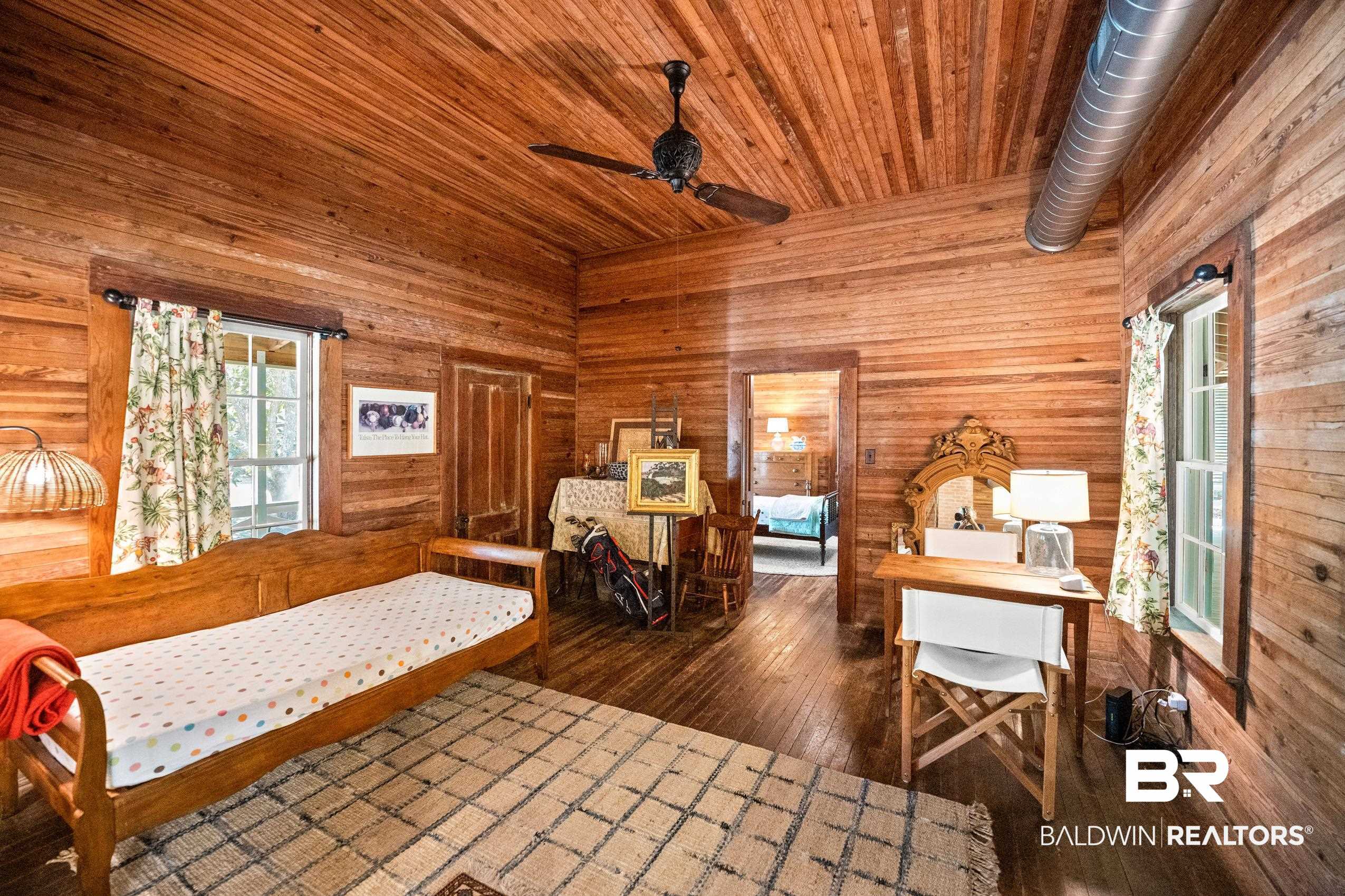 30671 Magnolia Street Elberta, AL 36530 - Photo 33 of 68 Bedroom with wooden ceiling, wooden walls, and hardwood / wood-style flooring