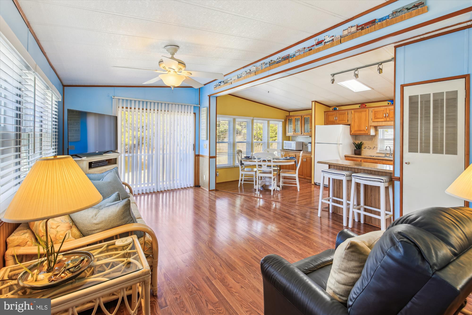 8801 Bay Ridge Drive Berlin, MD 21811 - Photo 15 of 51 Living Room/Kitchen with Sliders to Water Beyond