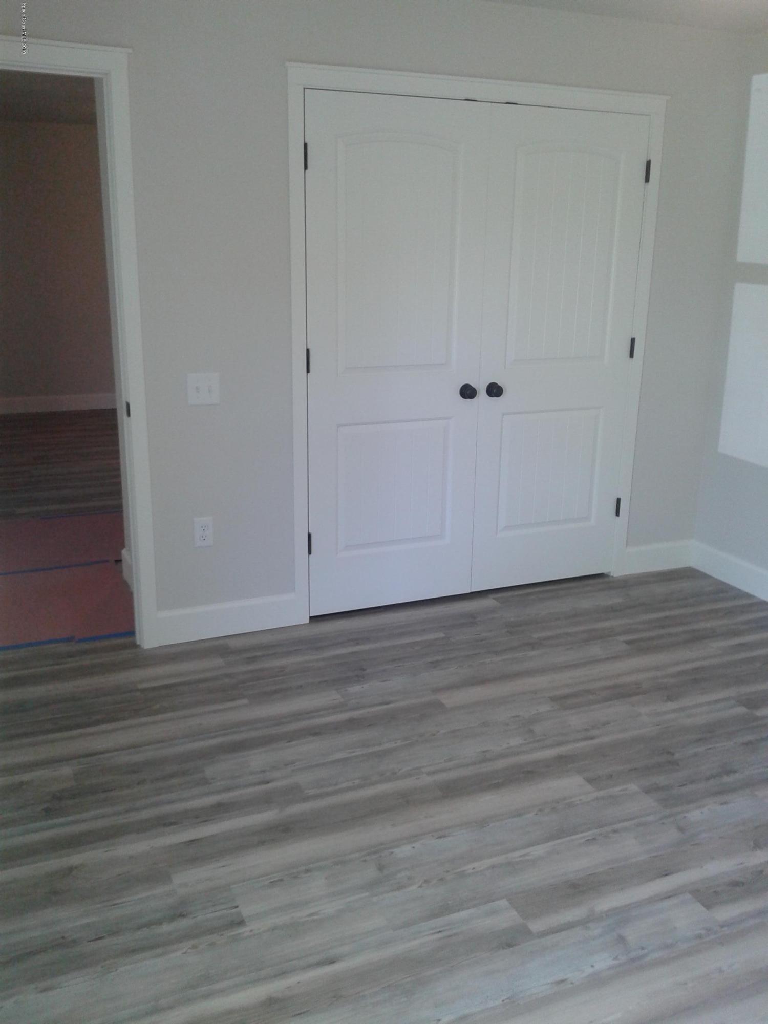 1851 Keewin Avenue, Unit 2 Palm Bay, FL 32905 - Photo 12 of 15 a view of wooden floor