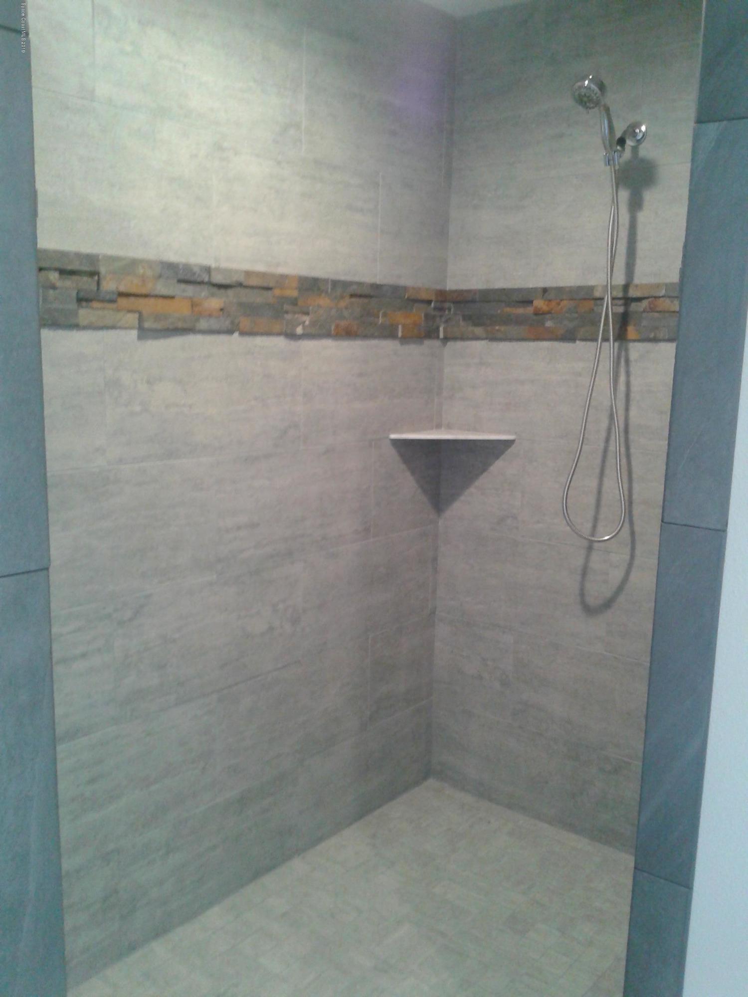 1851 Keewin Avenue, Unit 2 Palm Bay, FL 32905 - Photo 10 of 15 a bathroom with a shower