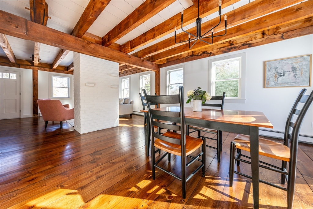 80 Branch Terrace Barnstable, MA 02648 - Photo 11 of 38 a dining room with furniture and wooden floor