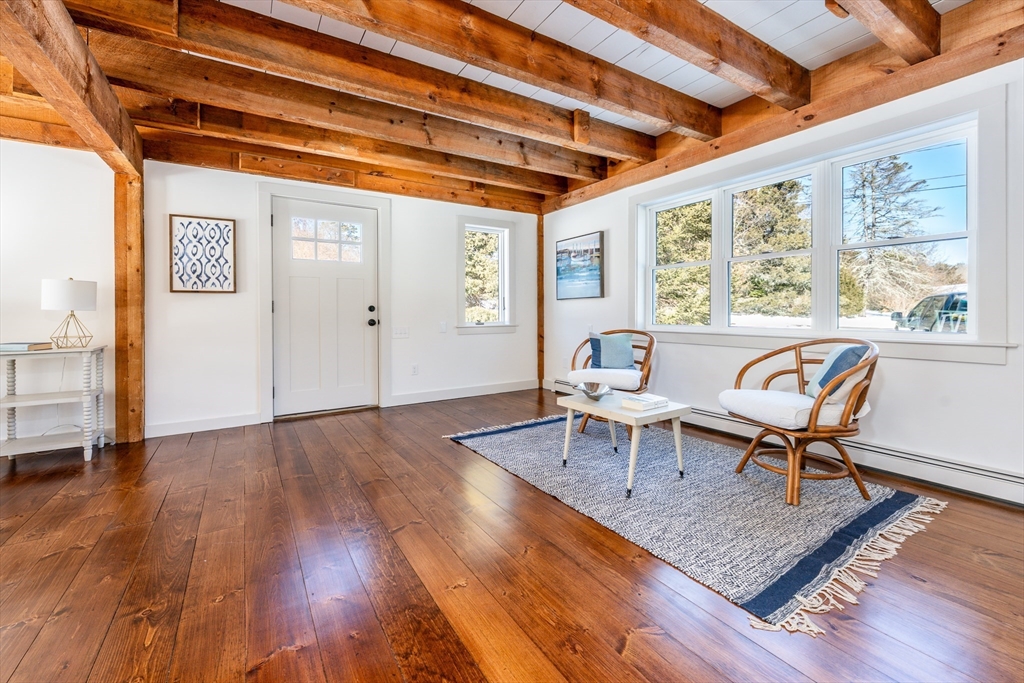 80 Branch Terrace Barnstable, MA 02648 - Photo 16 of 38 a living room with furniture and wooden floor