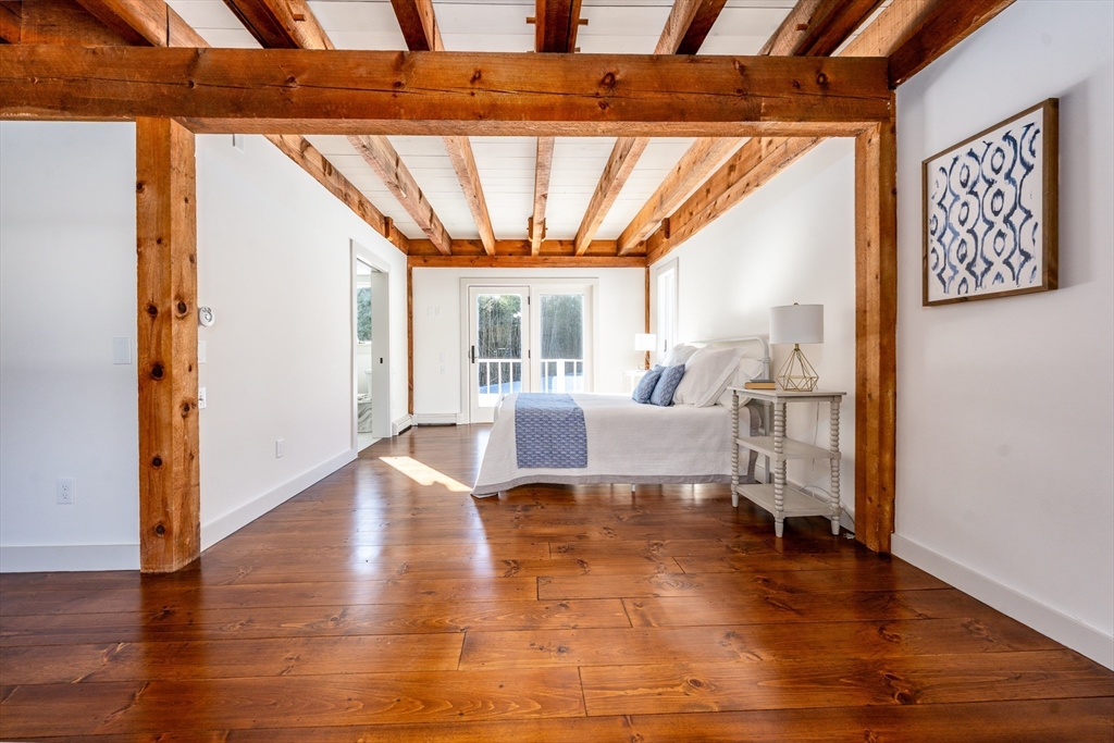80 Branch Terrace Barnstable, MA 02648 - Photo 20 of 38 a living room with furniture and a large window
