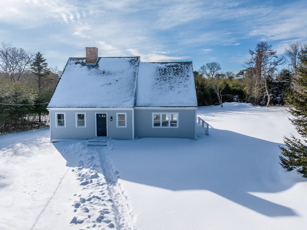 80 Branch Terrace Barnstable, MA 02648 - Photo 2 of 38 a front view of a house with a yard
