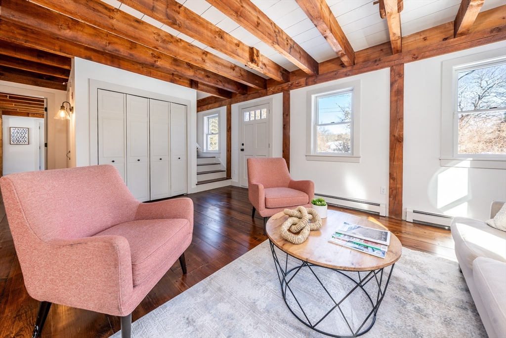 80 Branch Terrace Barnstable, MA 02648 - Photo 5 of 38 a living room with furniture and a dining table with wooden floor