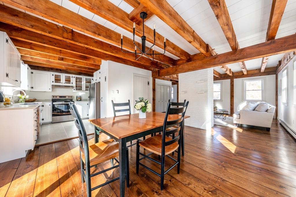 80 Branch Terrace Barnstable, MA 02648 - Photo 10 of 38 a dining room with furniture and wooden floor