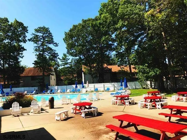 a group of cars parked in a parking lot
