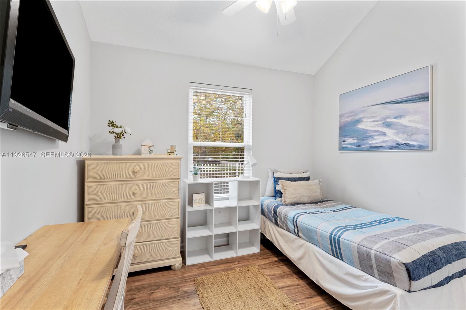 2 Poinciana Cove Road St. Augustine, FL 32084 - Photo 24 of 43 a bedroom with a bed and a flat screen tv
