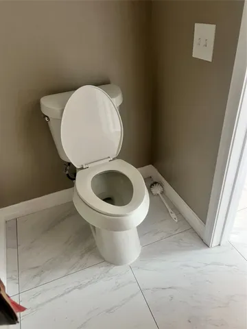 a close view of a toilet in a bathroom