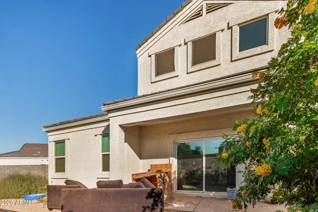 a view of a house with a large window