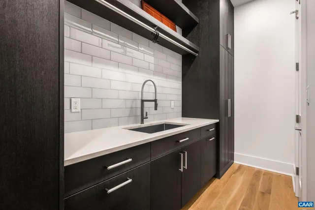 a view of a swimming pool with a lounge chairs
