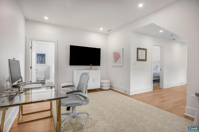 a view of a chairs and table in the patio