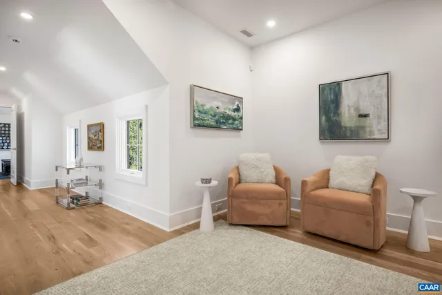 a view of a patio with table and chairs and potted plants