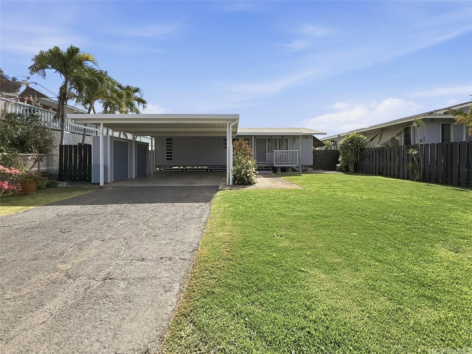 87-155 St John's Road Waianae, HI 96792 - Photo 1 of 25 Beautiful and Spacious front yard and carport with lots of room to park your cars and boat if you have