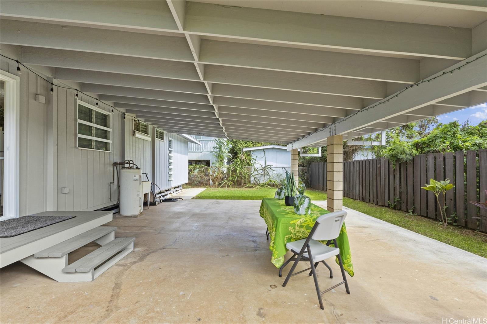 87-155 St John's Road Waianae, HI 96792 - Photo 20 of 25 Lanai as you walk out from the kitchen and dining. There is also space for your washer and dryer.