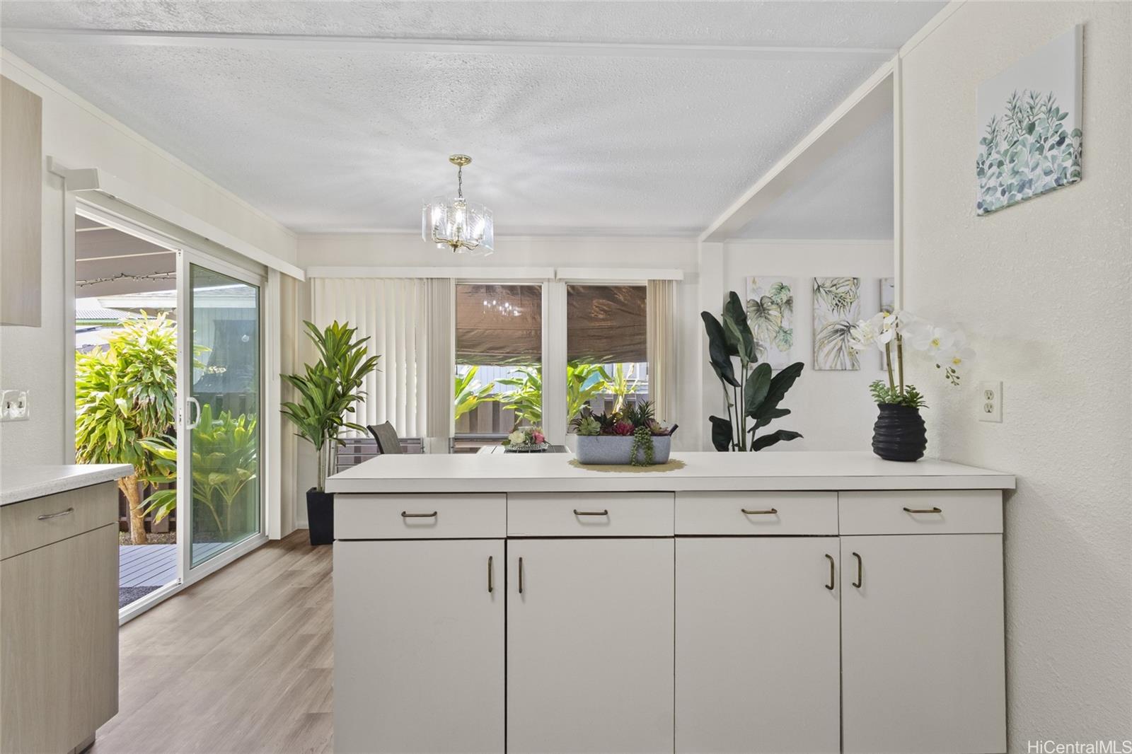 87-155 St John's Road Waianae, HI 96792 - Photo 5 of 25 More cabinets and also a space to eat as you watch the chef