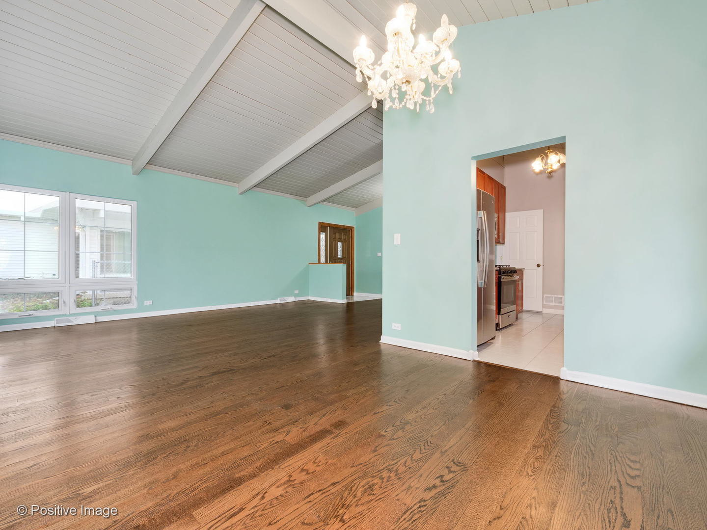 7505 East Prairie Road Skokie, IL 60076 - Photo 8 of 23 wooden floor in an empty room with a window