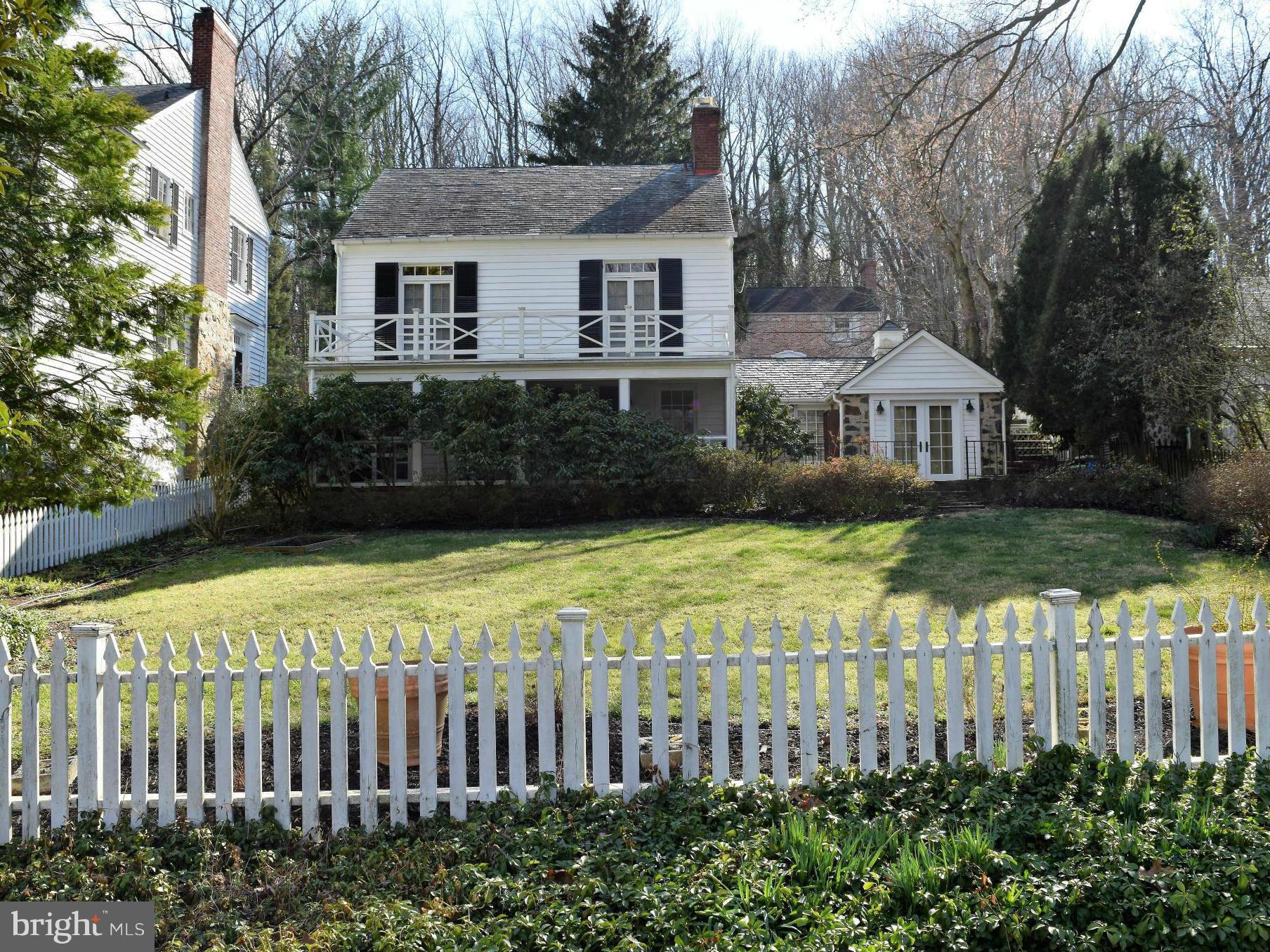 2539 Pickwick Road Baltimore, MD 21207 - Photo 2 of 30 a front view of a house with garden