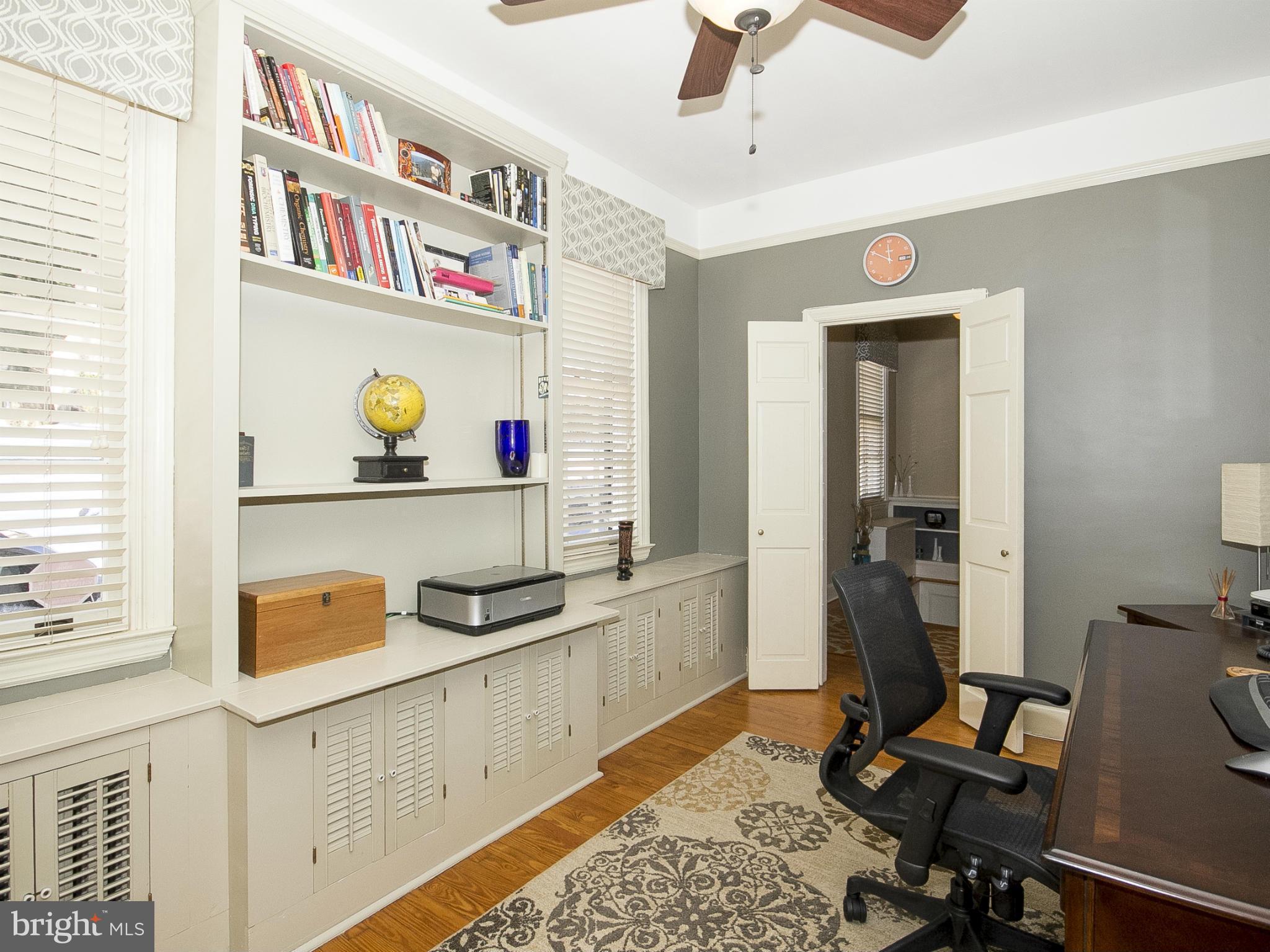 2539 Pickwick Road Baltimore, MD 21207 - Photo 20 of 30 a view of kitchen center island and living room