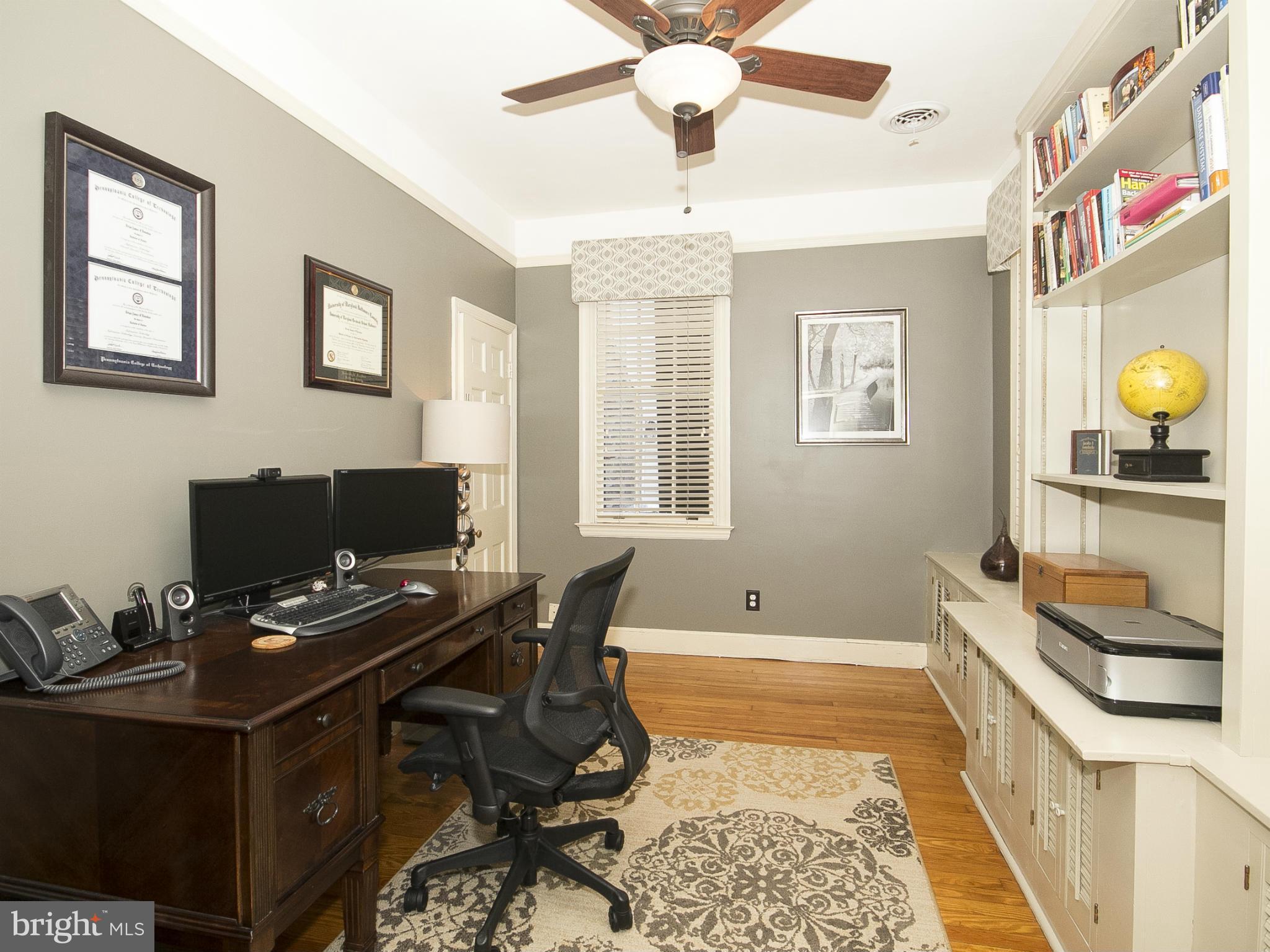 2539 Pickwick Road Baltimore, MD 21207 - Photo 21 of 30 a workspace with furniture and window