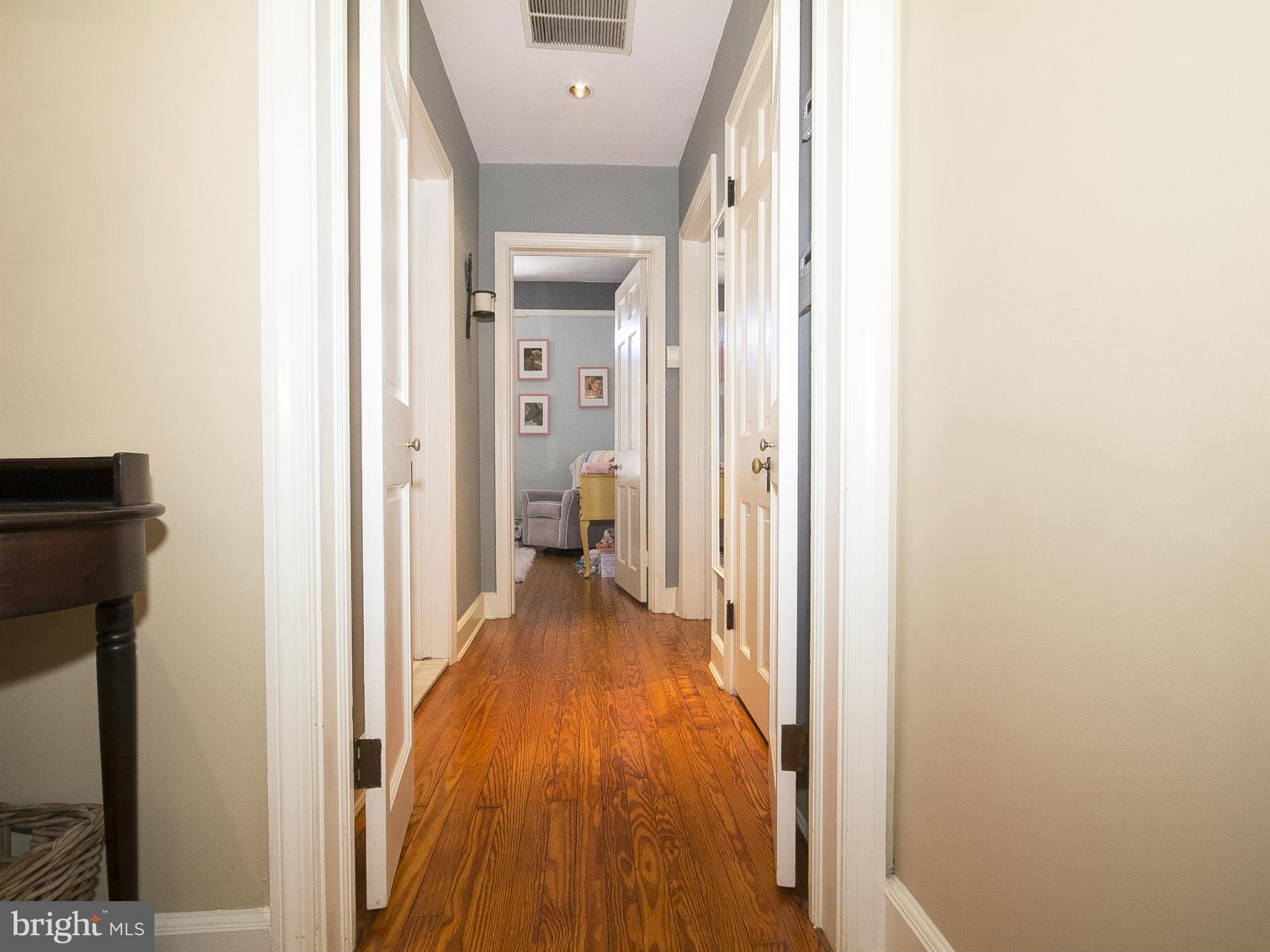 2539 Pickwick Road Baltimore, MD 21207 - Photo 22 of 30 a view of a bedroom from a hallway