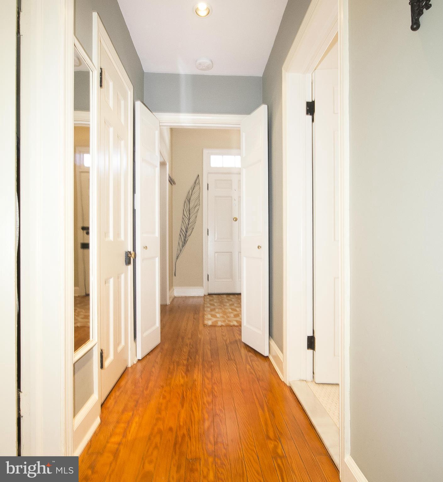 2539 Pickwick Road Baltimore, MD 21207 - Photo 28 of 30 a view of a hallway with wooden floor
