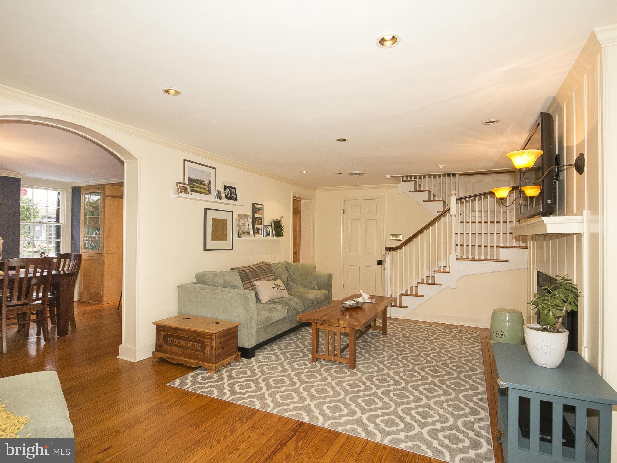 2539 Pickwick Road Baltimore, MD 21207 - Photo 7 of 30 a living room with furniture and a table