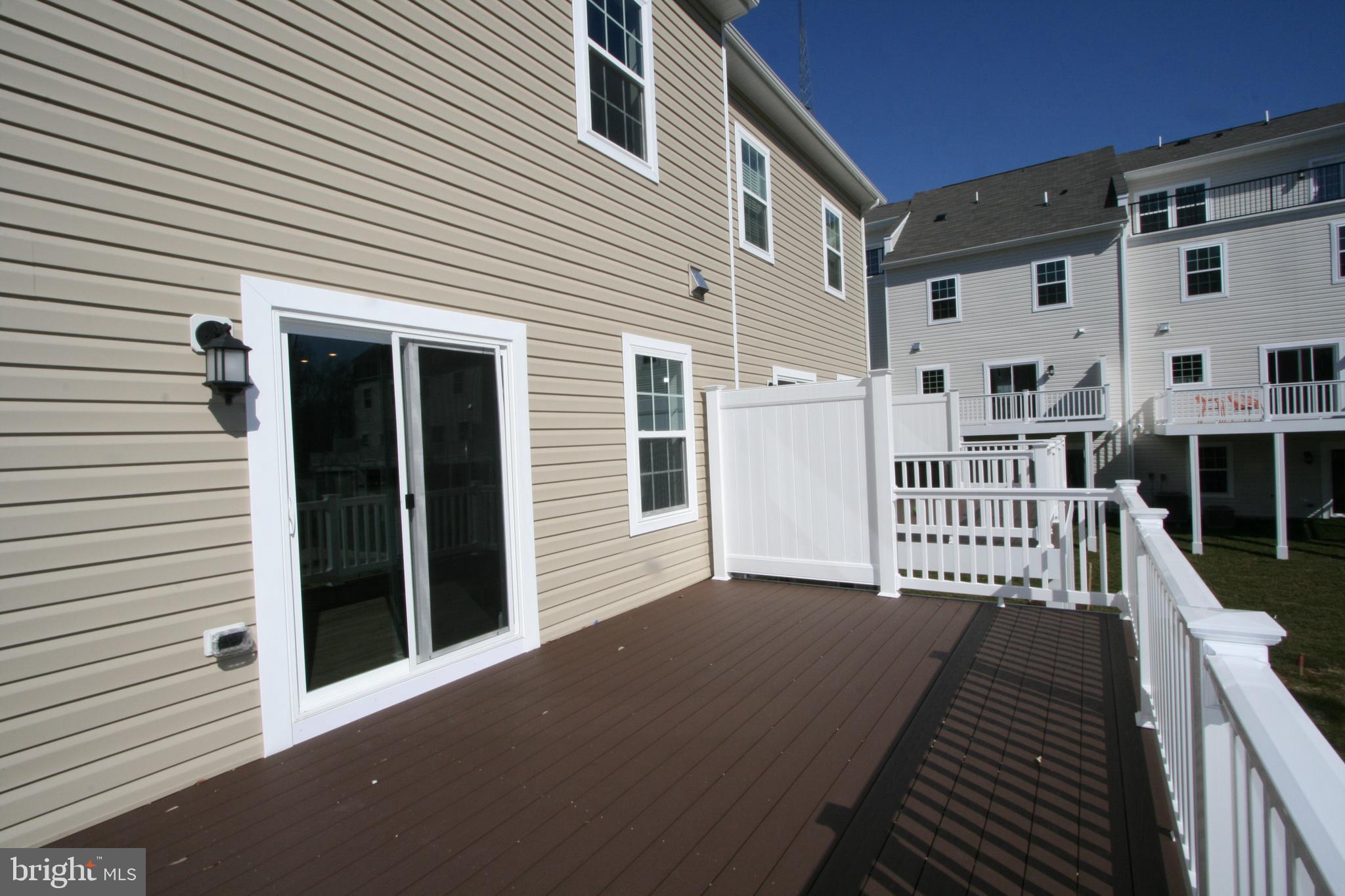 1016 Bluebells Road Gambrills, MD 21054 - Photo 26 of 52 a view of a house with balcony