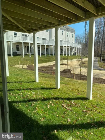 a view of swimming pool with an outdoor space and seating area