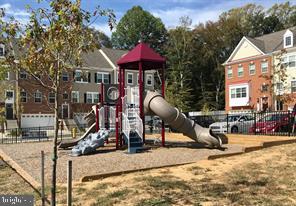 1016 Bluebells Road Gambrills, MD 21054 - Photo 46 of 52 a front view of a house with garden