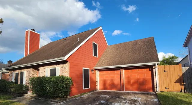 a backyard of a house with seating space