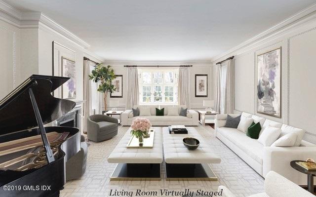 16 Rock Ridge Avenue Greenwich, CT 06831 - Photo 14 of 57 a living room with furniture a rug a window and a flat screen tv